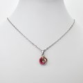 Tiny lesbian pride pendant, chainmail love knot charm, subtle, discreet LGBTQ jewelry