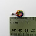 Tiny gay pride pendant, rainbow chainmail love knot, minimalist LGBTQ jewelry