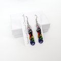 Progress pride flag earrings, handmade chainmail double spiral weave LGBTQ+ jewelry, rainbow, trans and BIPOC colors