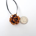 Handmade chainmail mini Halloween ornament, pumpkin orange, black, and purple seasonal dodecahedron decoration