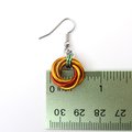 Small pumpkin earrings, fall jewelry with green leaf accent, handmade chainmail swirled knot -autumn, Halloween and Thanksgiving accessories