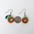 Small pumpkin earrings, fall jewelry with green leaf accent, handmade chainmail swirled knot -autumn, Halloween and Thanksgiving accessories