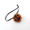 Handmade chainmail mini Halloween ornament, pumpkin orange, black, and purple seasonal dodecahedron decoration
