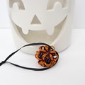 Handmade chainmail mini Halloween ornament, pumpkin orange, black, and purple seasonal dodecahedron decoration