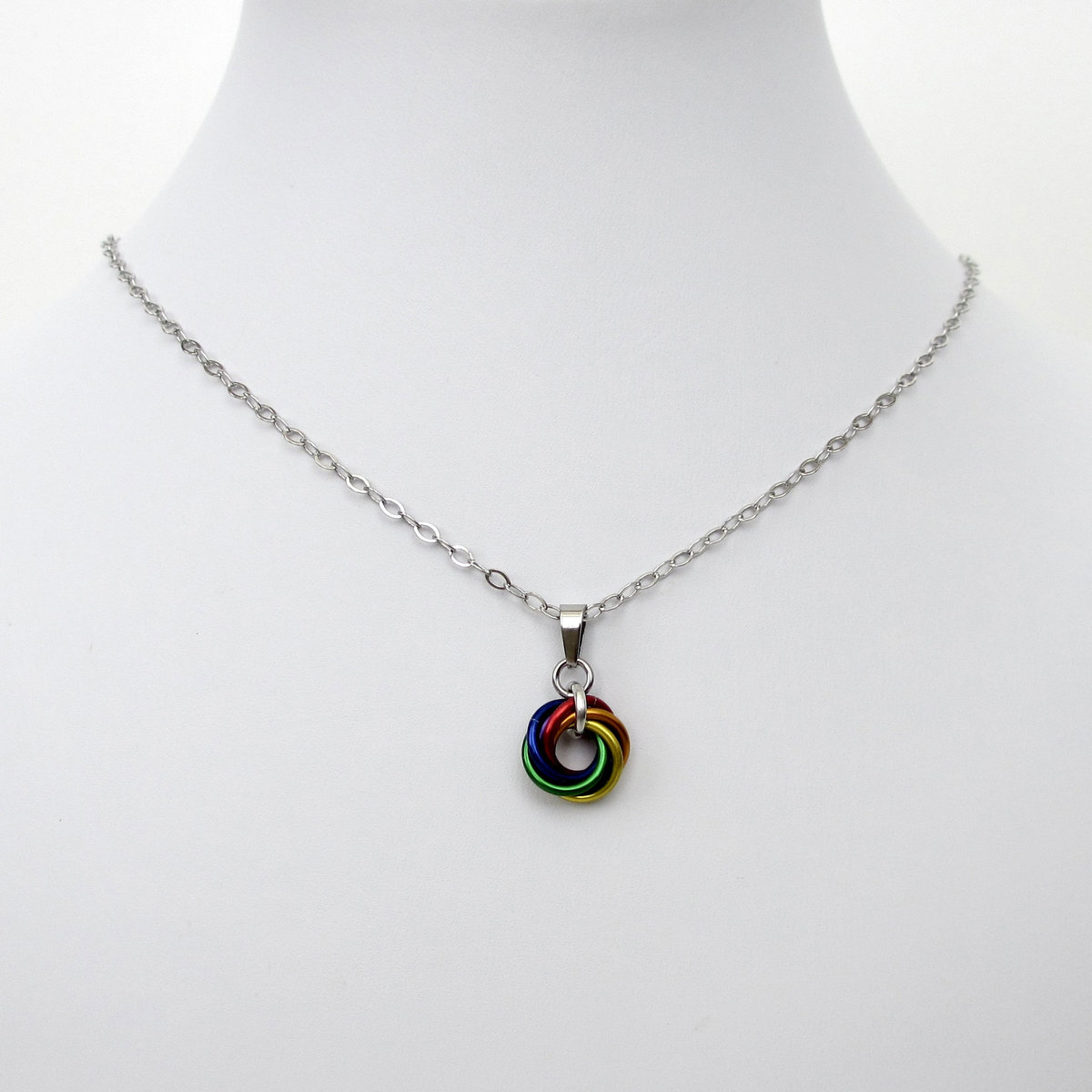 Tiny gay pride pendant, rainbow chainmail love knot, minimalist LGBTQ jewelry