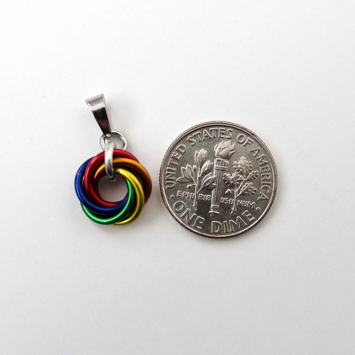 Tiny gay pride pendant, rainbow chainmail love knot, minimalist LGBTQ jewelry