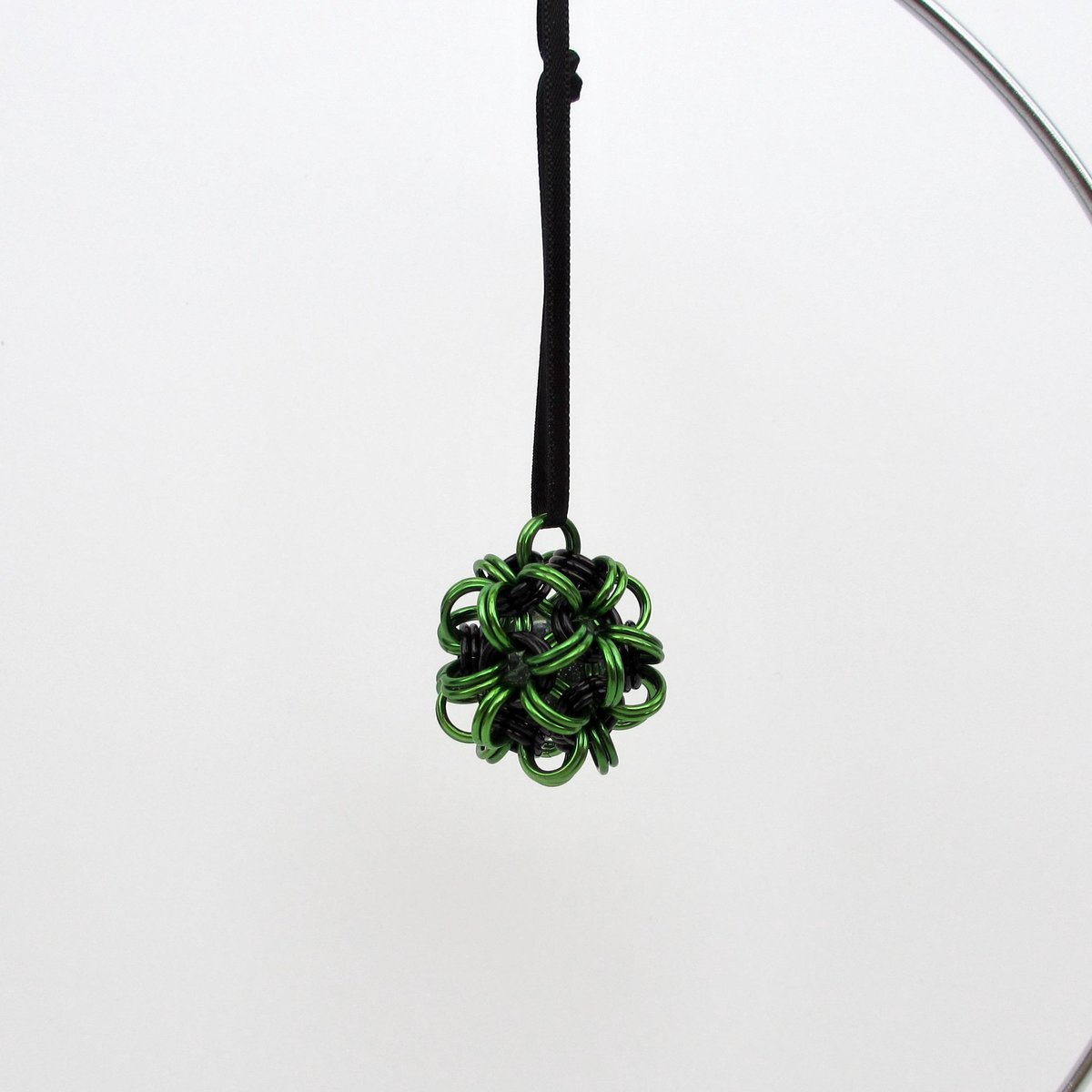 Halloween ornament in gothic green and black, handmade chainmail dodecahedron ball, unique bag charm