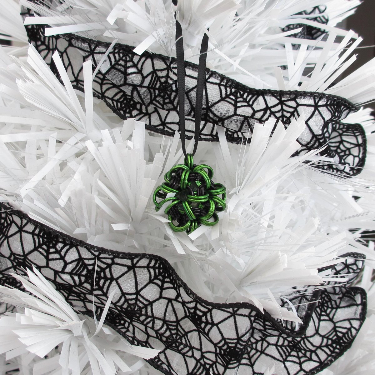Halloween ornament in gothic green and black, handmade chainmail dodecahedron ball, unique bag charm