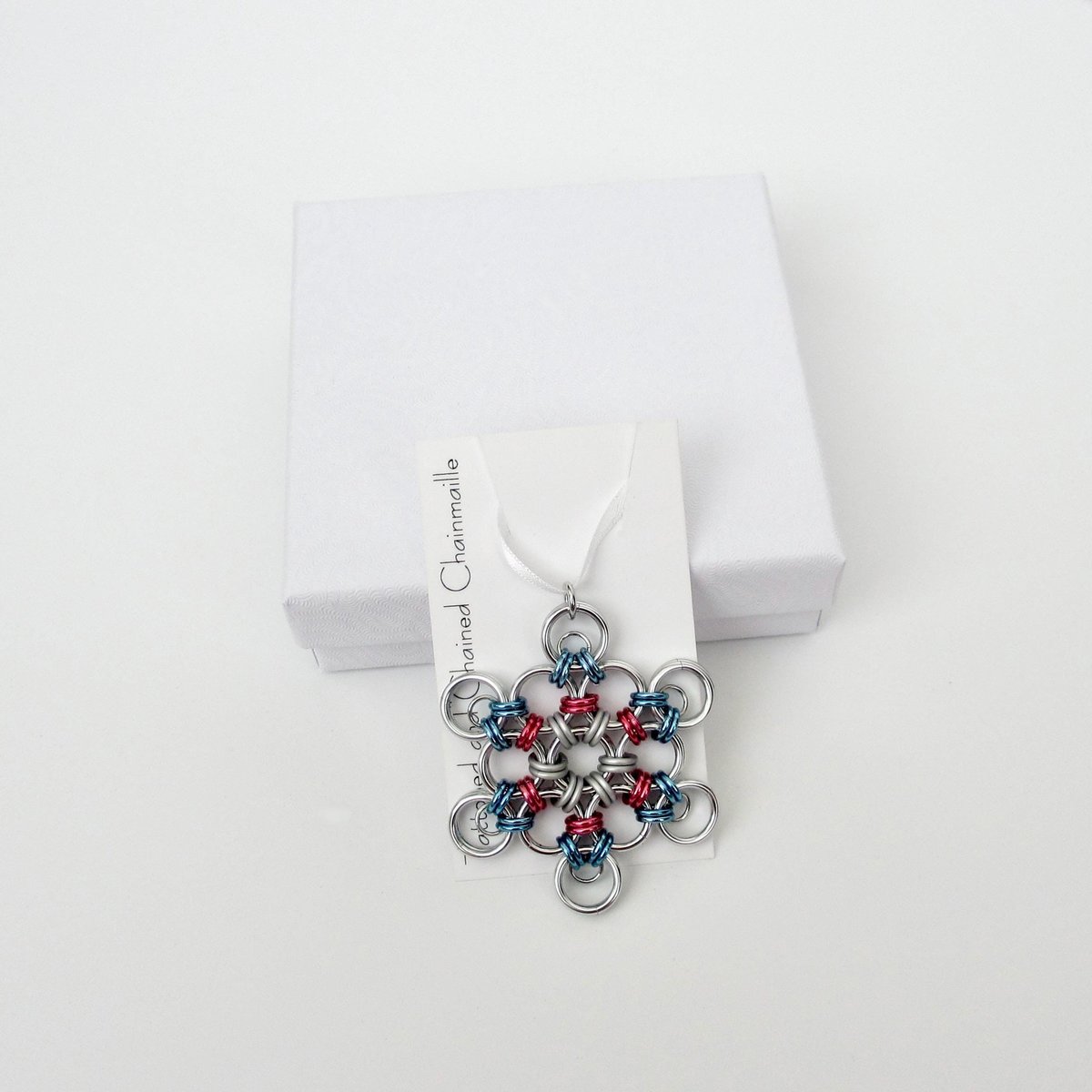 Transgender pride snowflake ornament, handmade chainmail holiday decoration in blue, pink and white