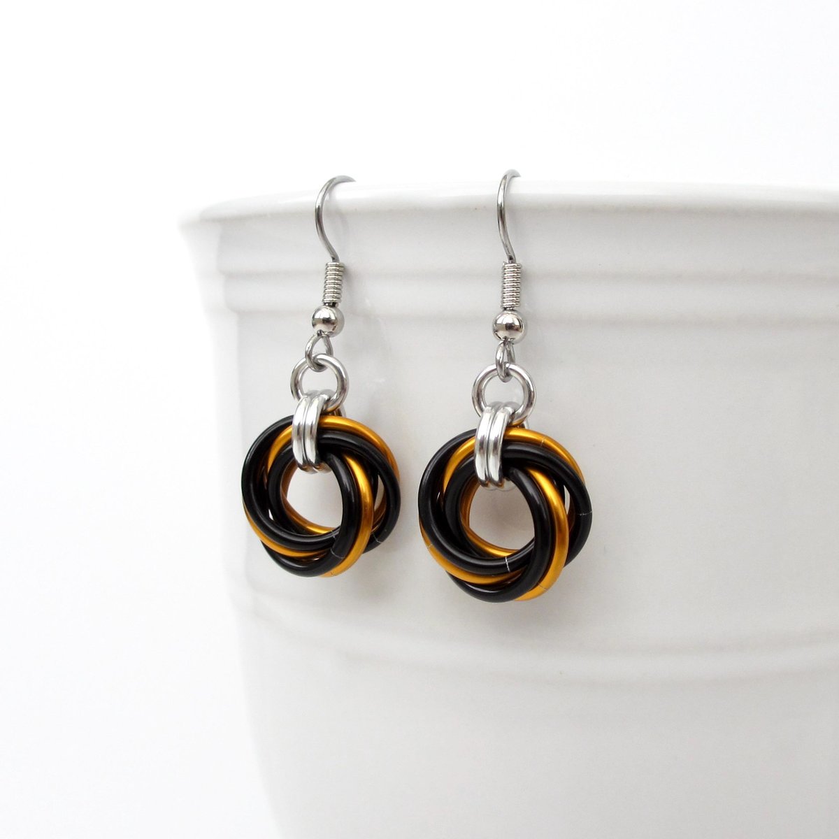 Orange & black knot earrings, handmade chainmail Halloween jewelry