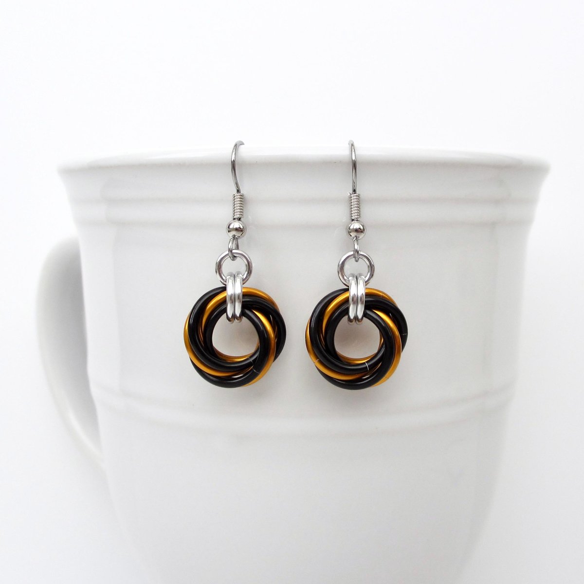 Orange & black knot earrings, handmade chainmail Halloween jewelry