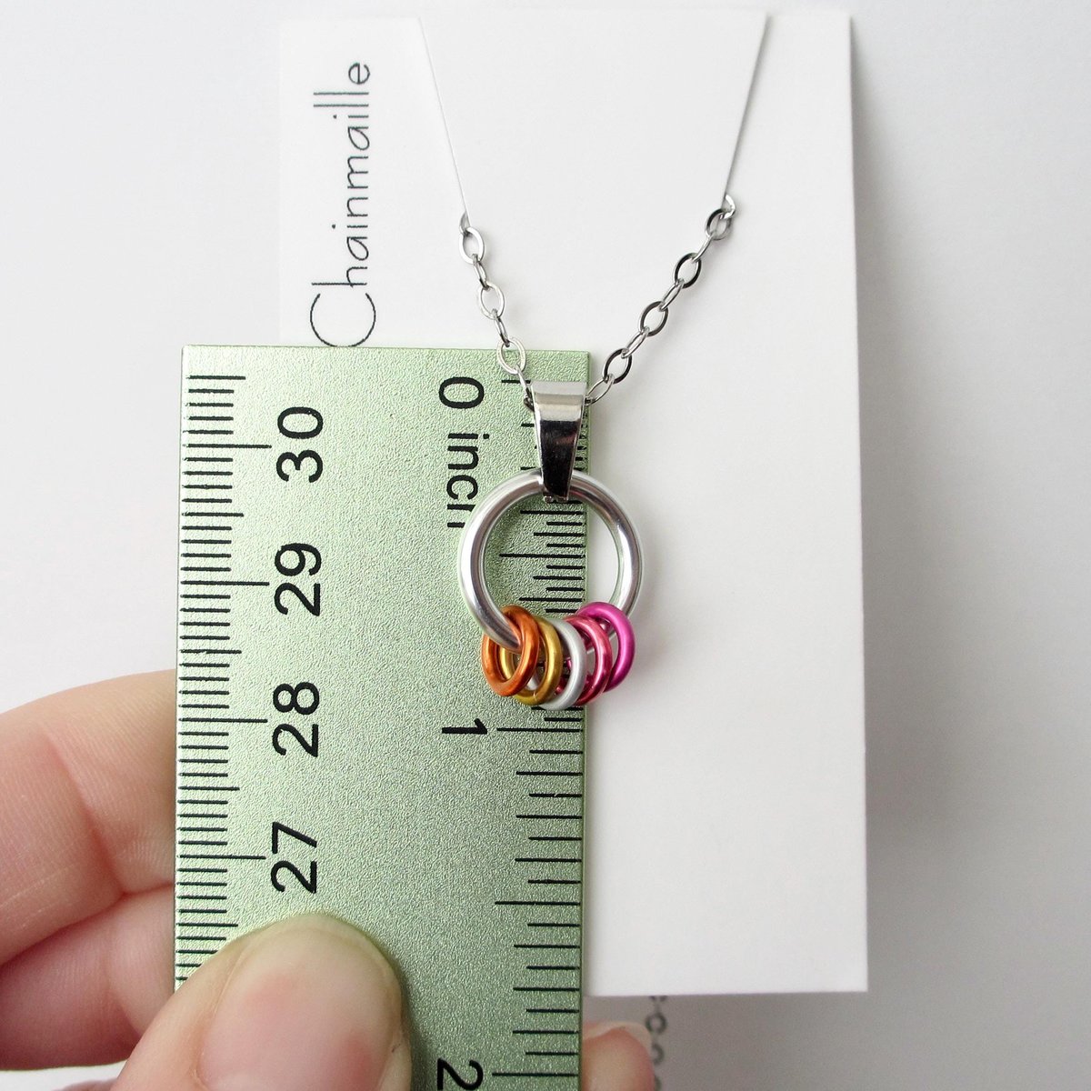 Minimalist Lesbian Pride Pendant with Floating Rings in Sunset Flag Colors - Handmade LGBTQ Jewelry