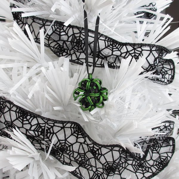 Halloween ornament in gothic green and black, handmade chainmail dodecahedron ball, unique bag charm