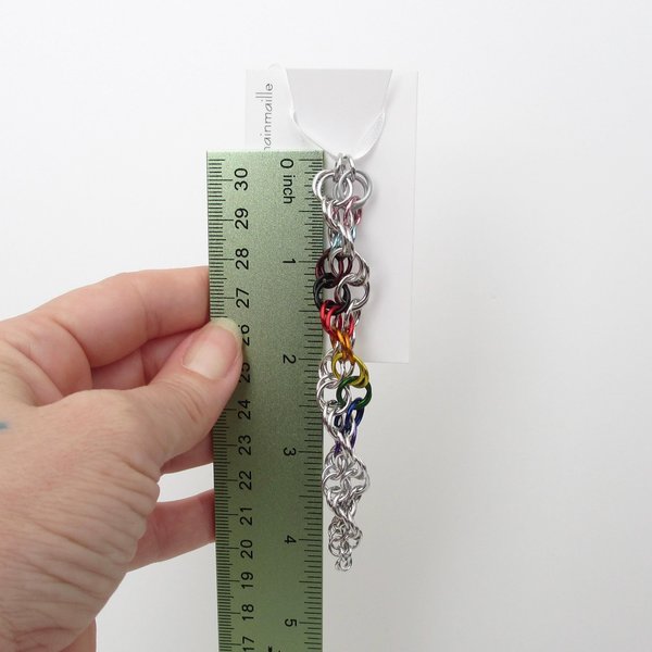 Progress pride flag icicle ornament, handmade chainmail spiral in rainbow, trans, and BIPOC colors