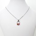 Minimalist Lesbian Pride Pendant with Floating Rings in Sunset Flag Colors - Handmade LGBTQ Jewelry