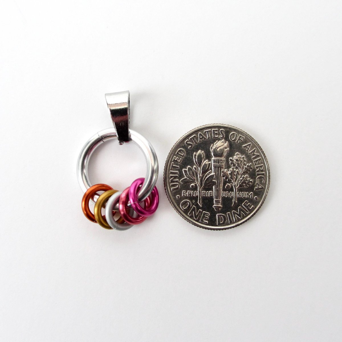 Minimalist Lesbian Pride Pendant with Floating Rings in Sunset Flag Colors - Handmade LGBTQ Jewelry